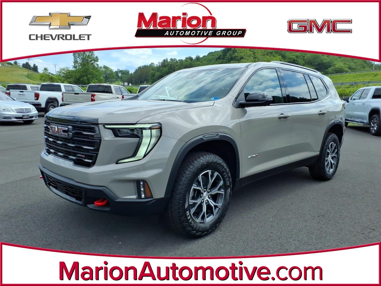 2026 GMC Acadia AT4 in Riverstone Metallic — front three-quarter view