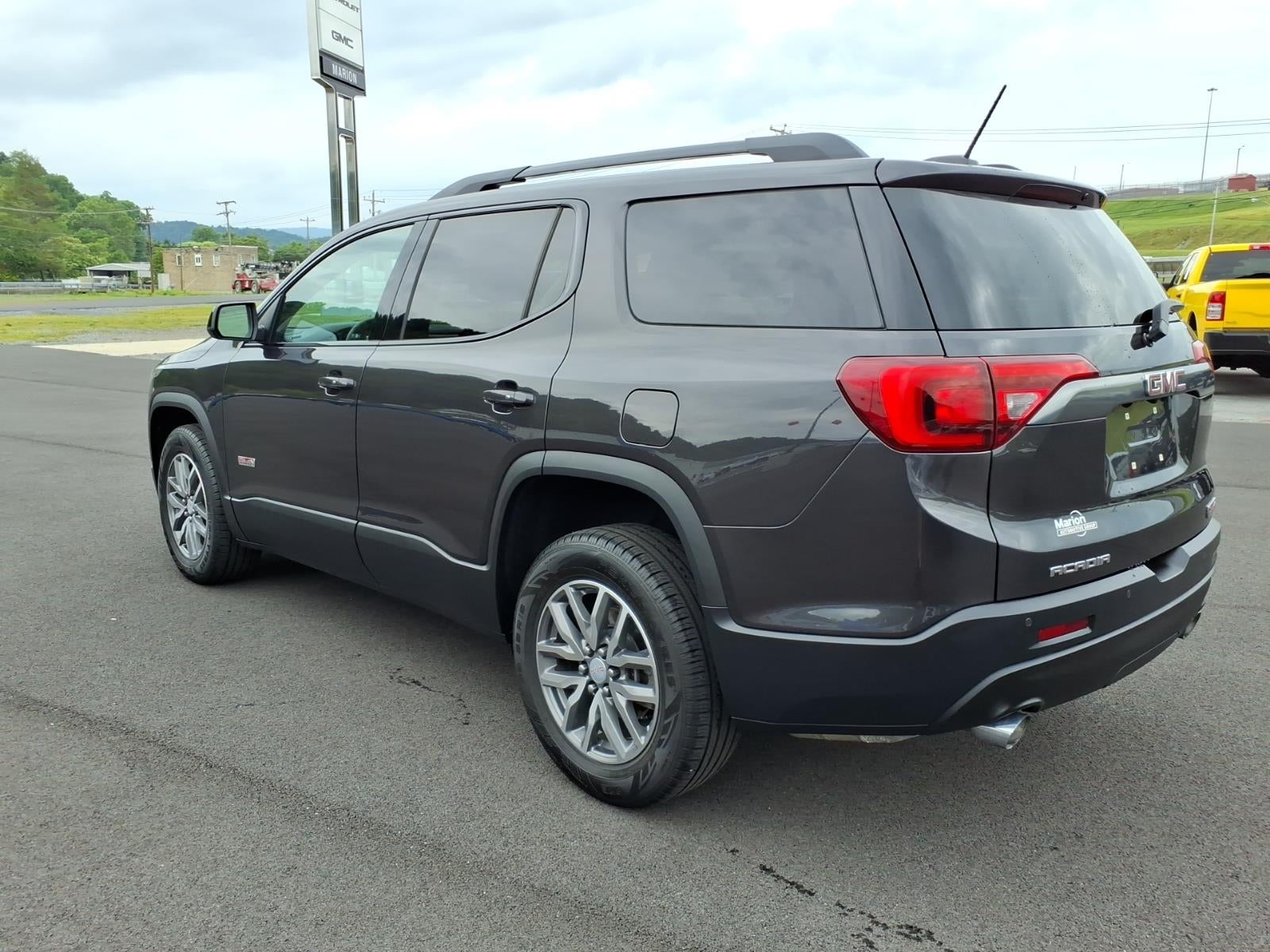 2017 GMC Acadia — rear three-quarter view