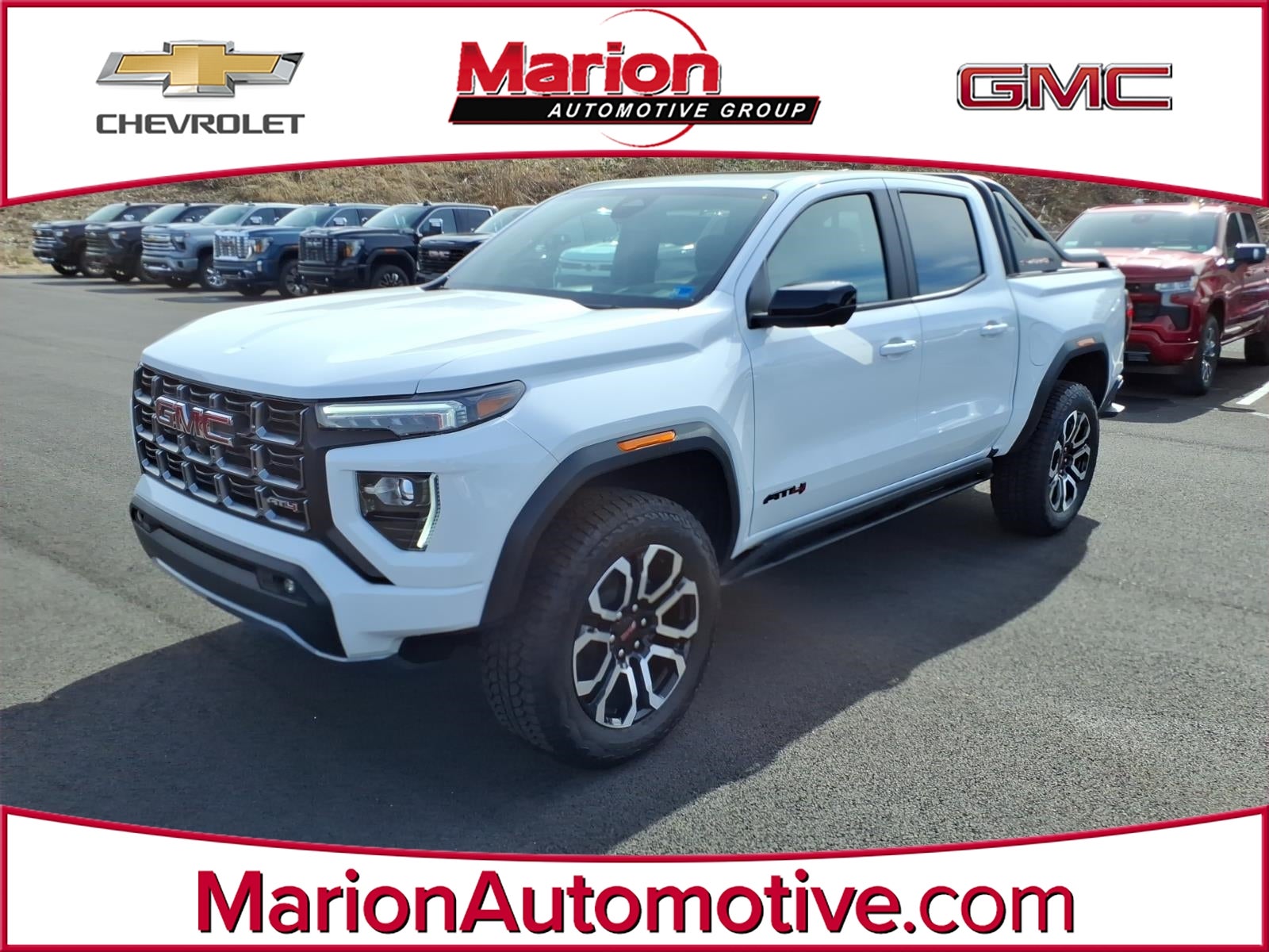 2025 GMC Canyon AT4 in Summit White — front three-quarter view